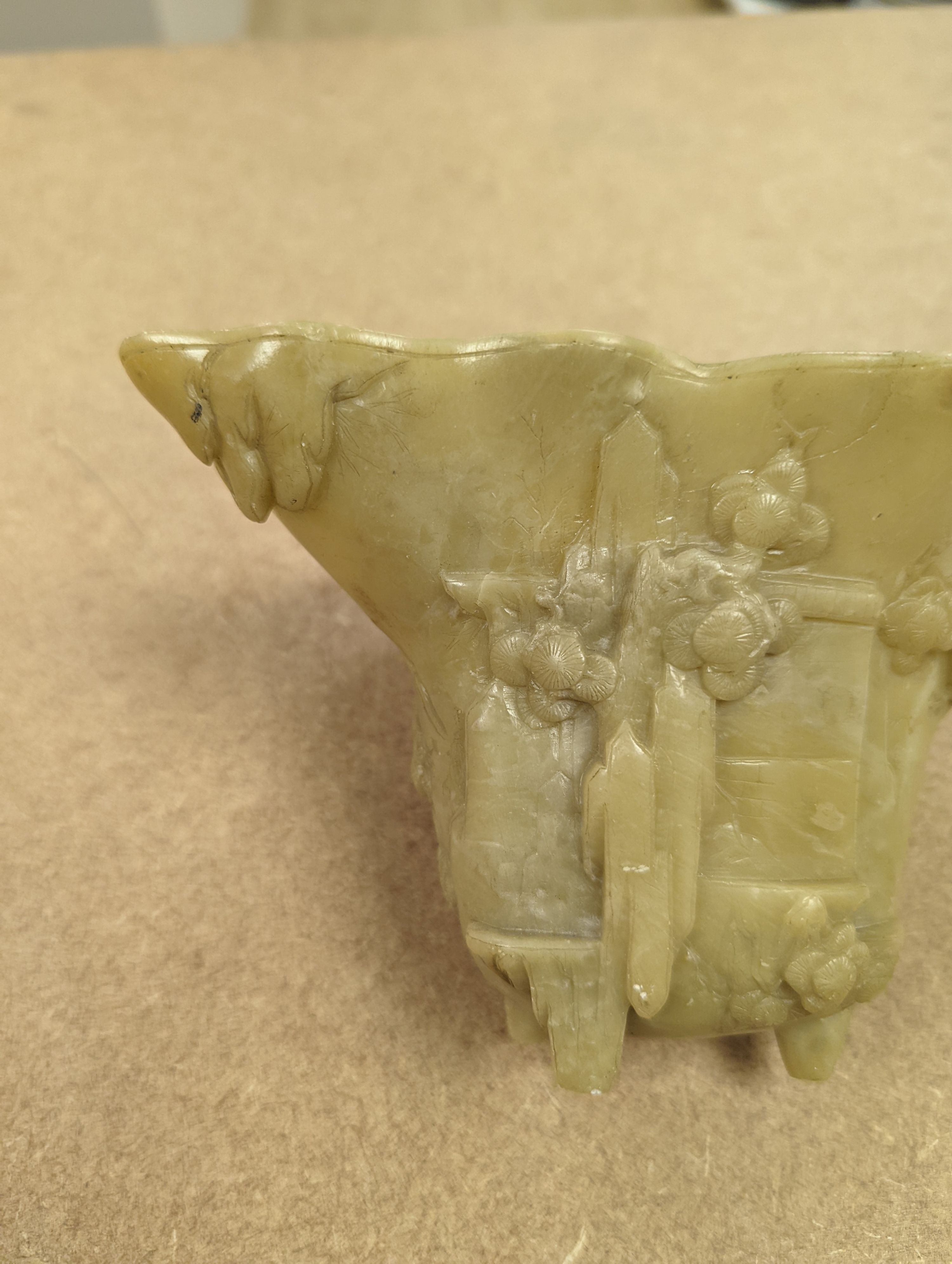 A Chinese carved soapstone libation cup, 19cm